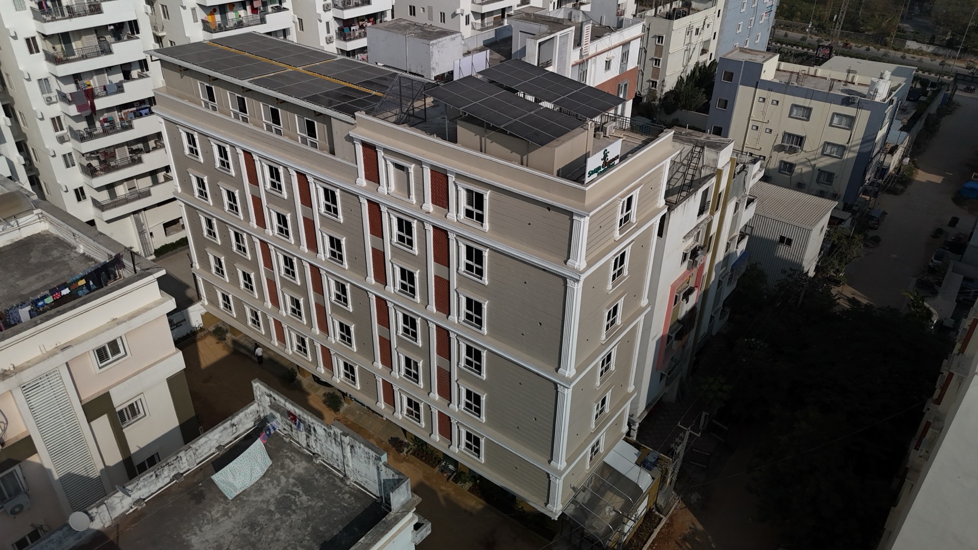 Solar panels on hotel rooftop for green energy